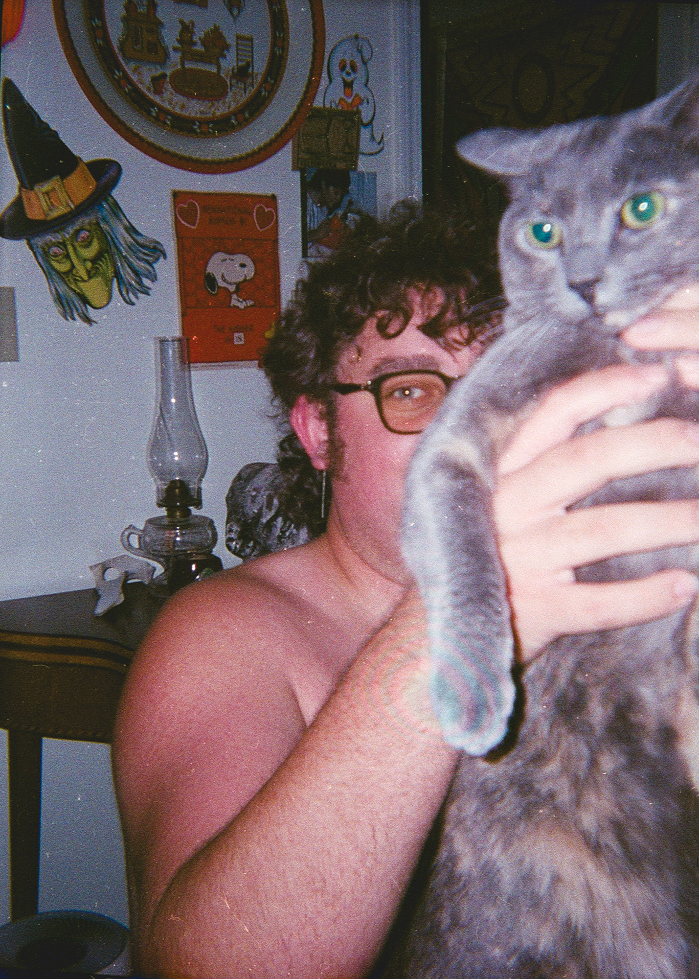 Portrait of the artist with feline, Rissa Groves, 2025